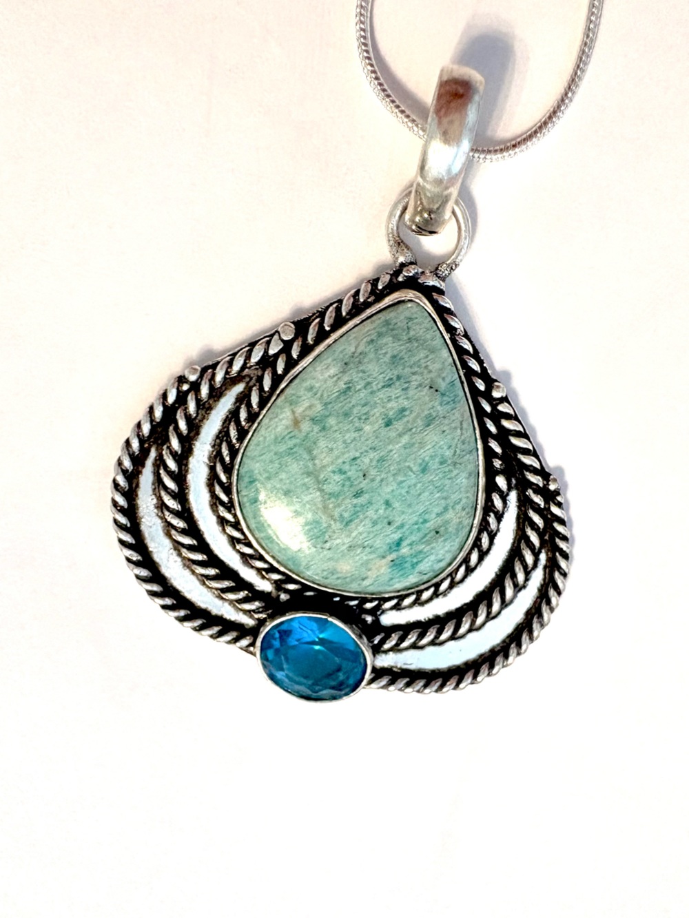 2 inch. 925 marked , Amazonite  and Blue Topaz pendant on s silver chain.